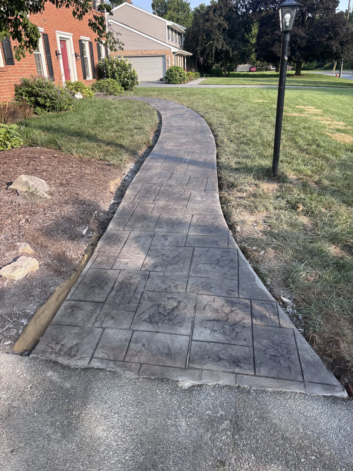 Stamped curved walkway completed by T-Bones Concrete