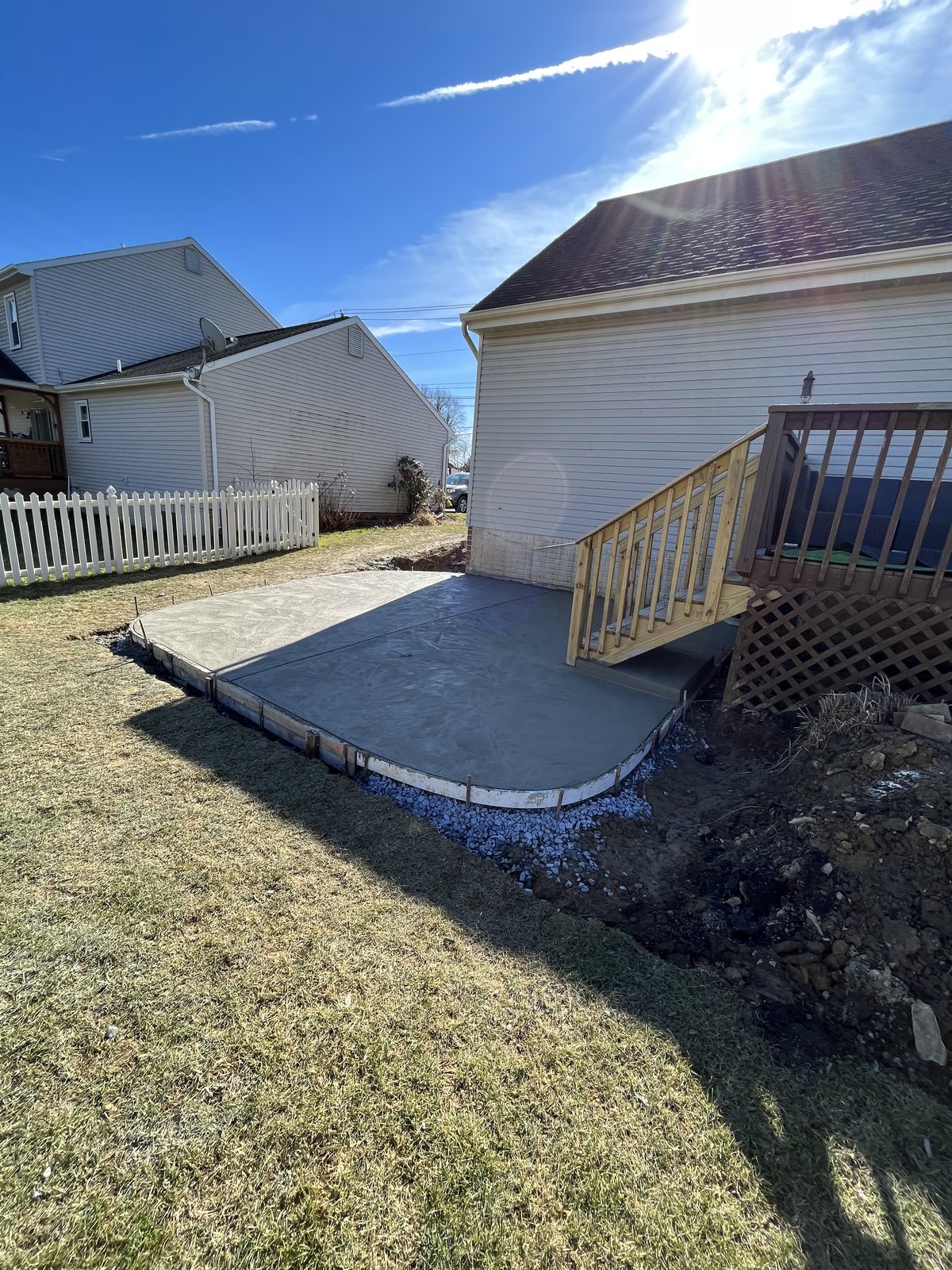 Backyard utility pad completed by T-Bones Concrete