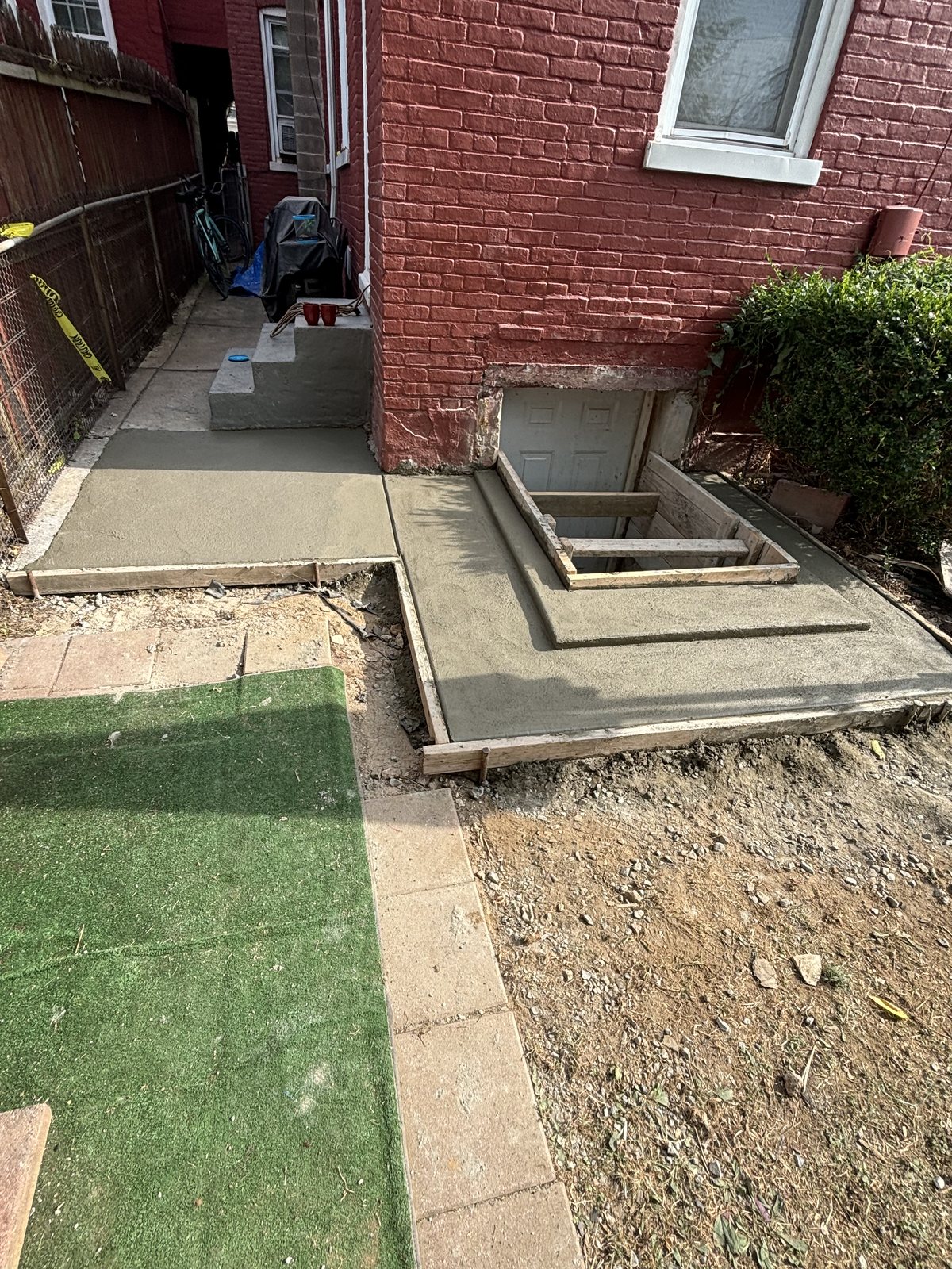 Side porch walkway completed by T-Bones Concrete